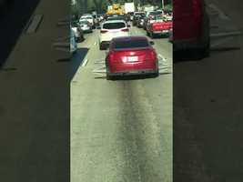 Car With Protruding Wire Rims Drives Down Highway - 986023 - YouTube