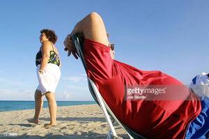 https://media.gettyimages.com/photos/people-enjoy-themselves-june-7-2001-on-the-beach-in-hollywood-florida-picture-id1319989?s=612x612